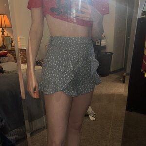 Blue floral ILLA ILLA shorts with ruffles. High waisted. Got at cute boutique